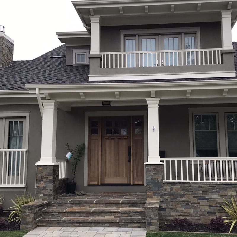 Craftsman home exterior with new windows and entry door