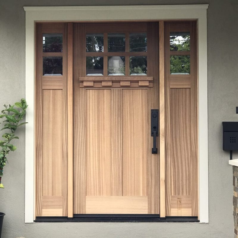 Natural cedar front door with double sidelights