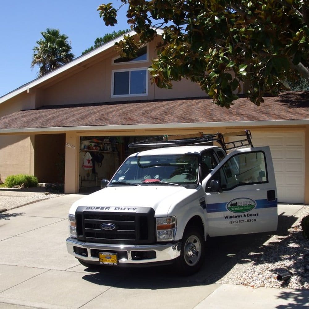 Window Station service truck outside a Peninsula home