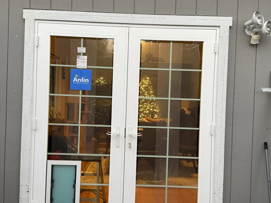 White grid French doors with built-in pet door, San Carlos, CA