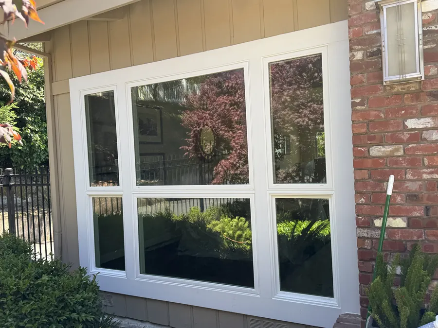 White picture and awning window combination beside brick, Redwood City, CA