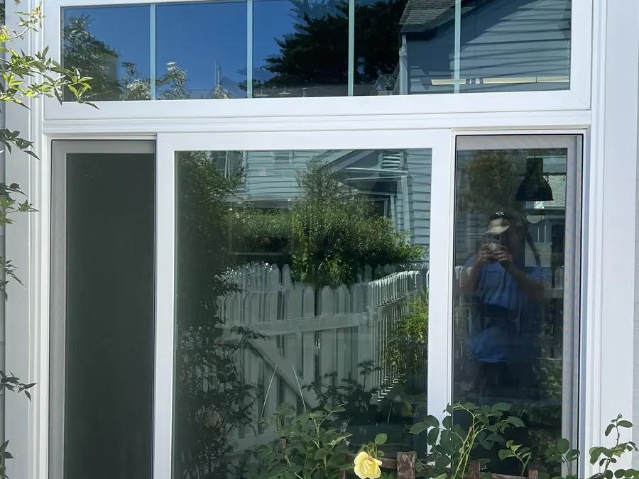 Picture window and transom over a rose garden, Foster City, CA