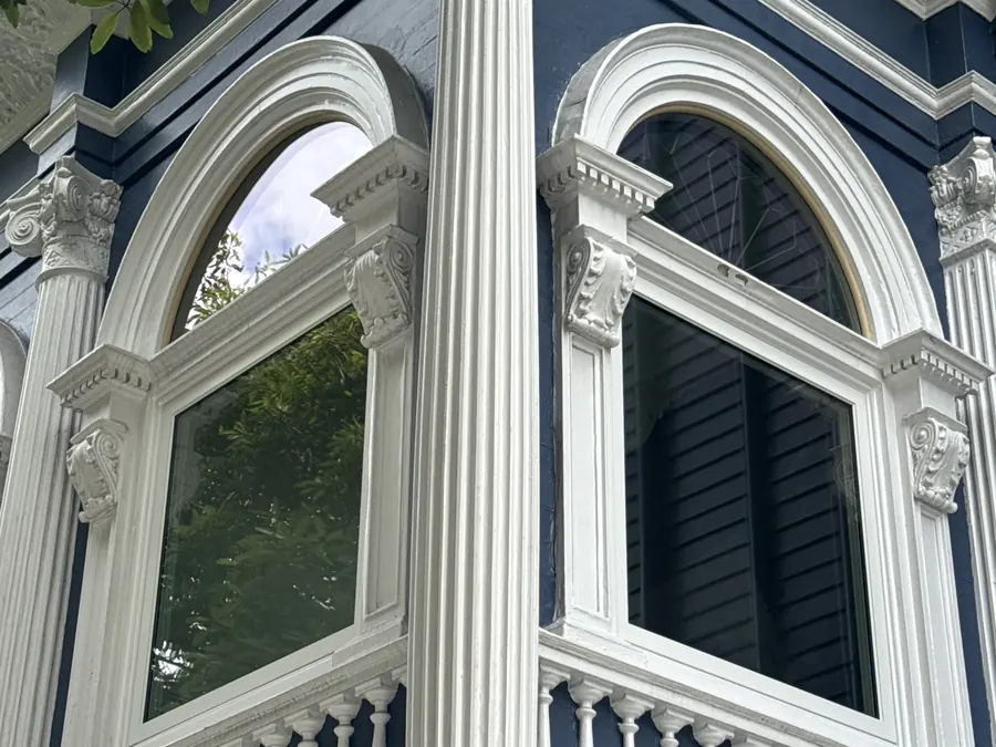 Ornate Victorian corner with new arched windows
